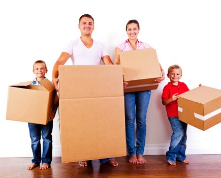 Moving van and packed boxes for a house removal in Stratford
