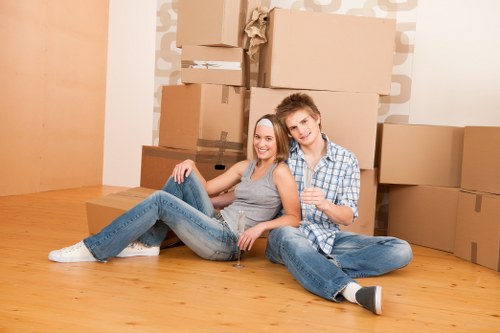 Professional movers handling office furniture in Stratford