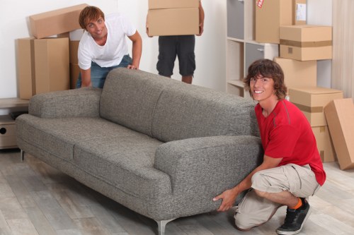 Team loading furniture into a removal van for a Stratford move