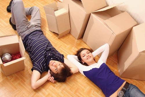 A Stratford family home moving setup with labelled boxes and furniture protection