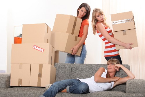 Packed office equipment and furniture ready for transport
